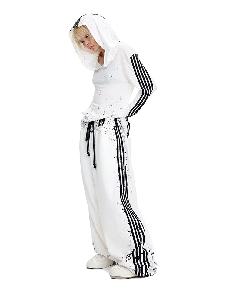 CFIERCE Music Staff Print Wide-Leg Sweatpants - white music staff sweatpants modeled angled side