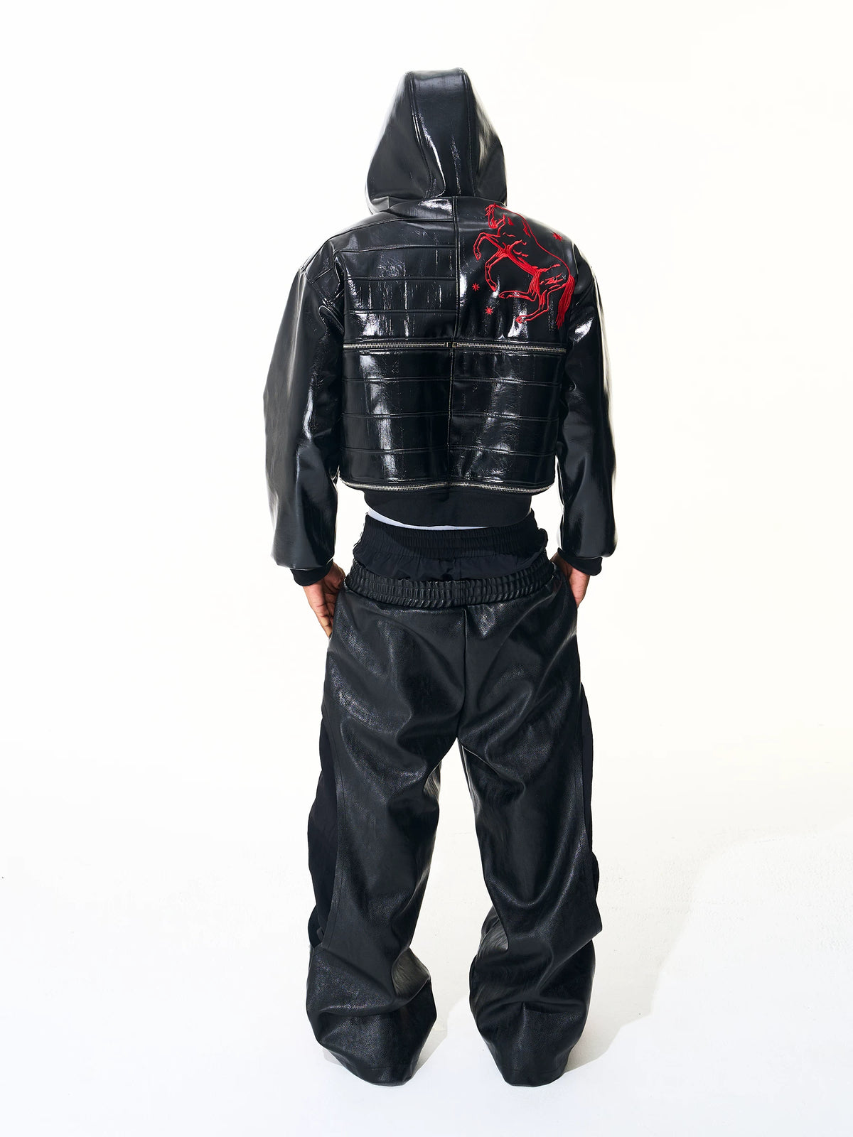 Full rear outfit showing black wide-leg pants