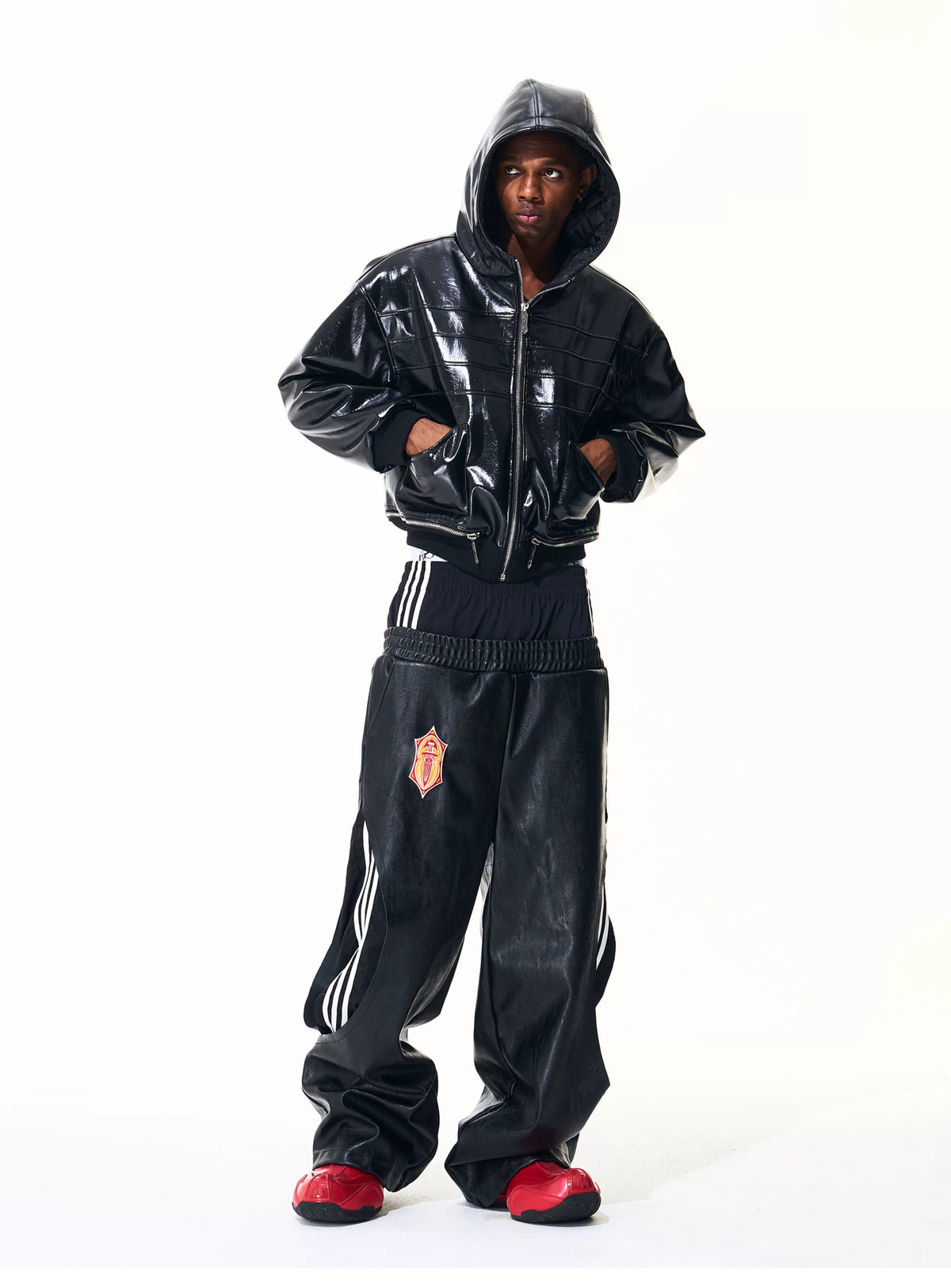 Front outfit showing black wide-leg pants with patch detail