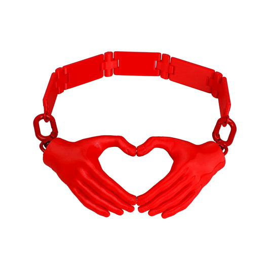USIC X JEFF FREE PARK red magnetic heart hands necklace on white background