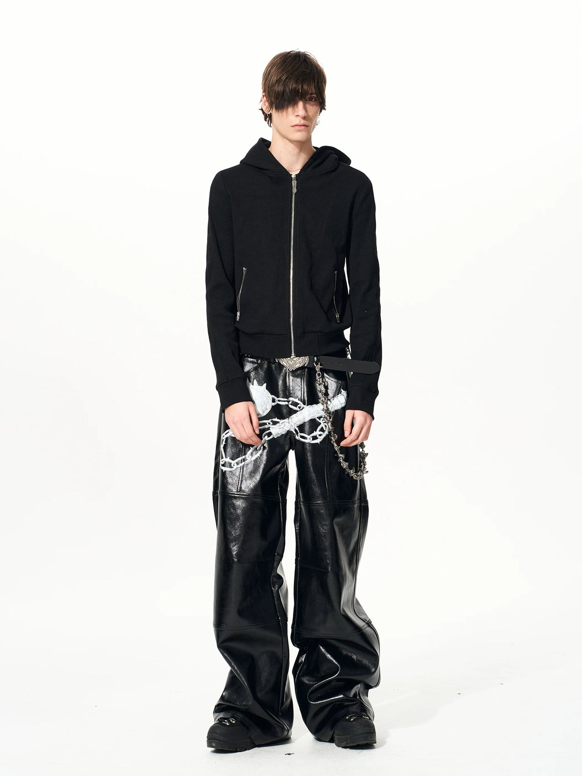 Full-length front styling of black zip hoodie