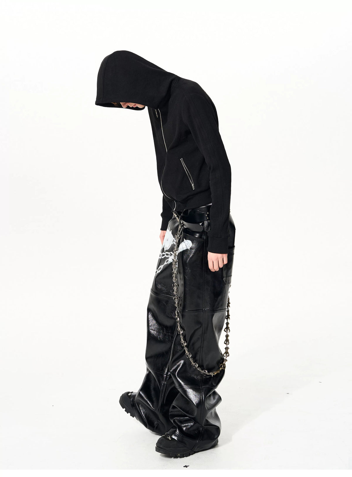 Side profile of black zip hoodie