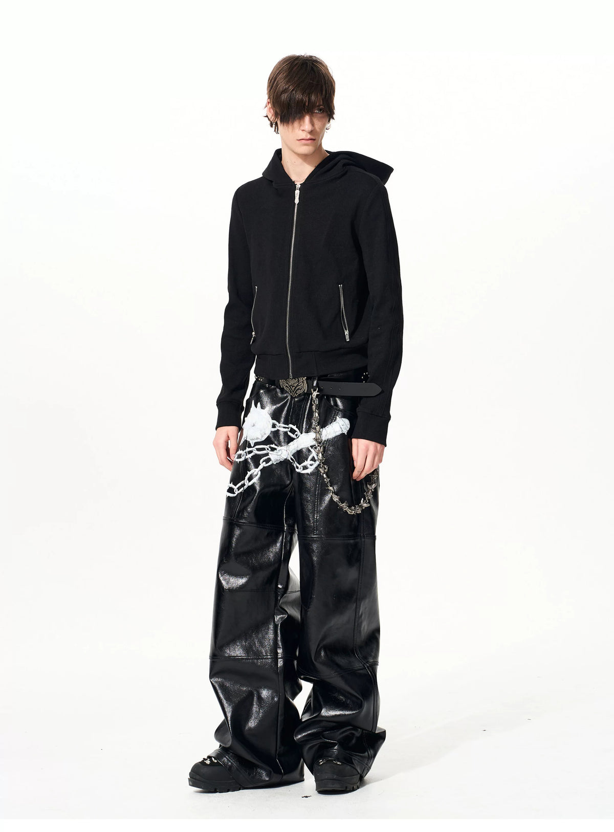 Three-quarter front view of black zip hoodie