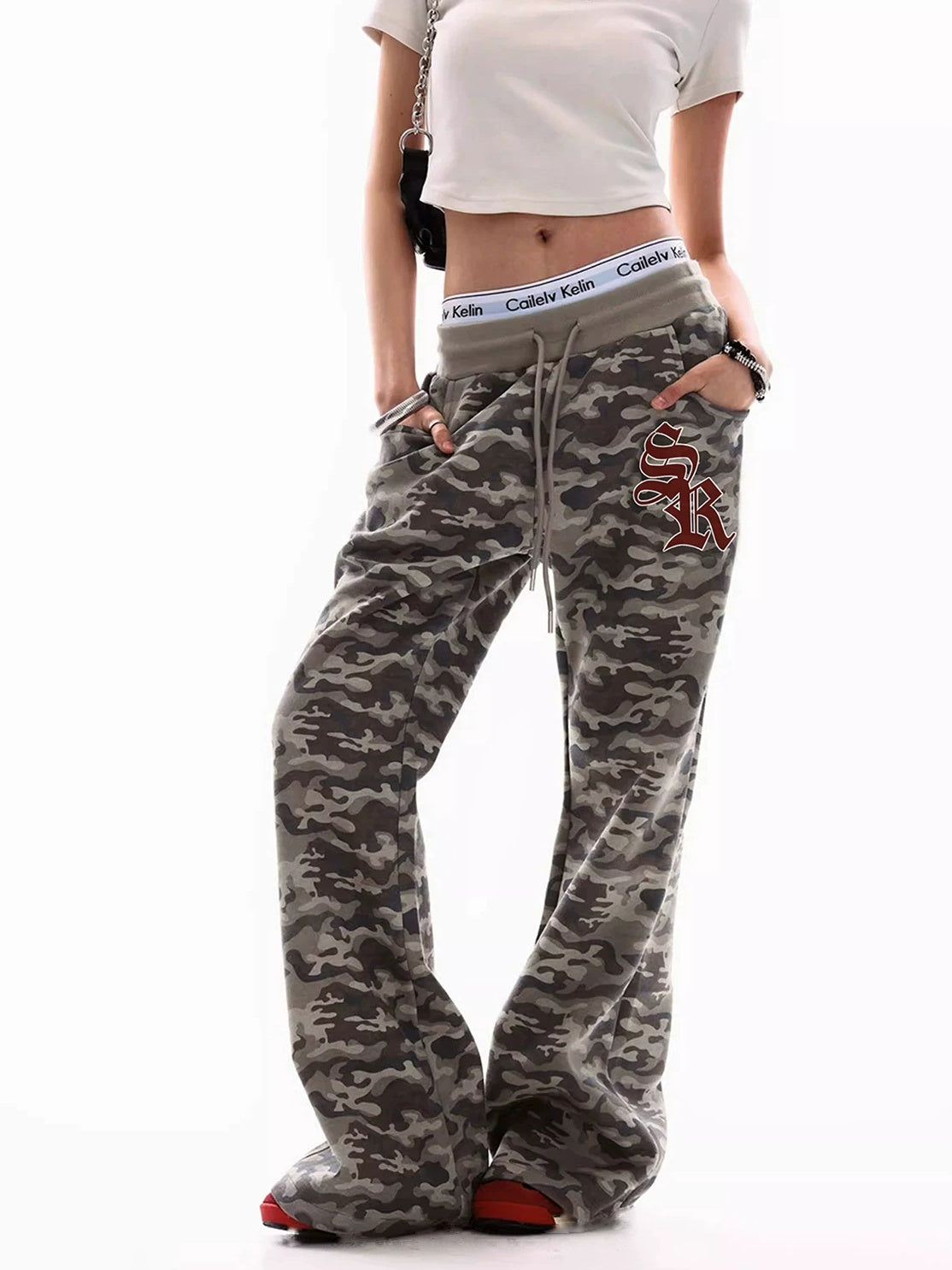 0123Start Camo Flared Sweatpants - hand in pocket